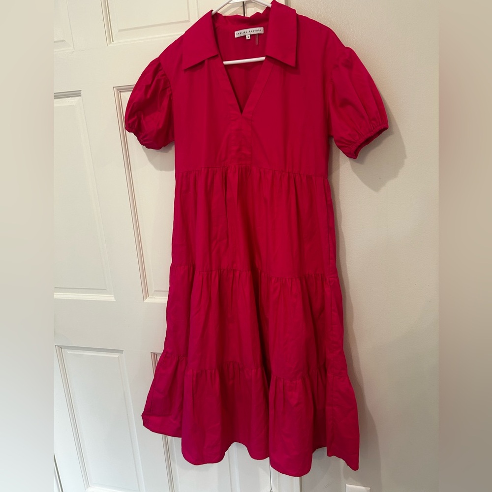 English factory size small pink dress. Lined with pockets
